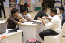 People in conversation at startup expo